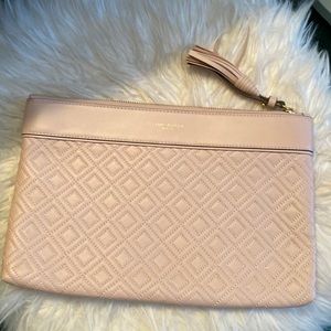 NWOT quilt clutch with tassel & emblem